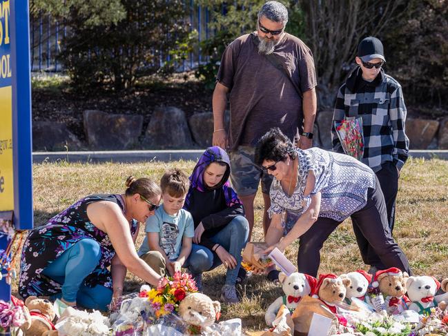 Peter Dodt’s family at the tribute site. Picture: Jason Edwards