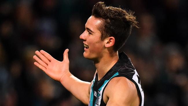 Connor Rozee of the Power celebrates after kicking a goal during the round 14 AFL match between the Port Adelaide Power and the Geelong Cats at Adelaide Oval.