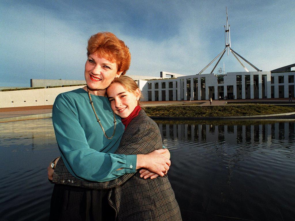 Pauline Hanson gives her daughter Lee, 12, a hug in 1996.