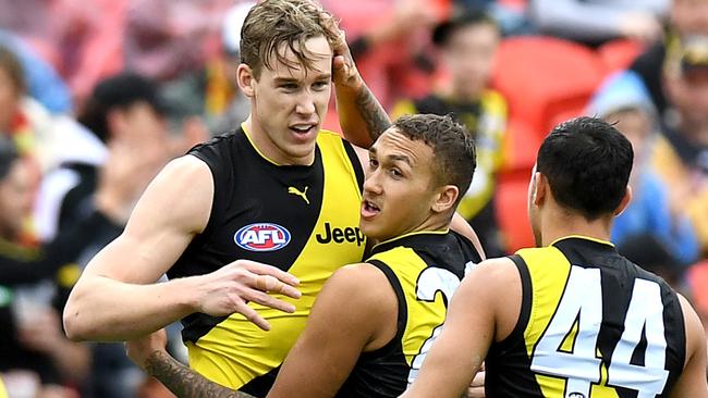 GOLD COAST, AUSTRALIA - JULY 06: Tom Lynch of the Tigers and Shai Bolton celebrate during the round 16 AFL match between the Gold Coast Suns and the Richmond Tigers at Metricon Stadium on July 06, 2019 in Gold Coast, Australia. (Photo by Bradley Kanaris/Getty Images)