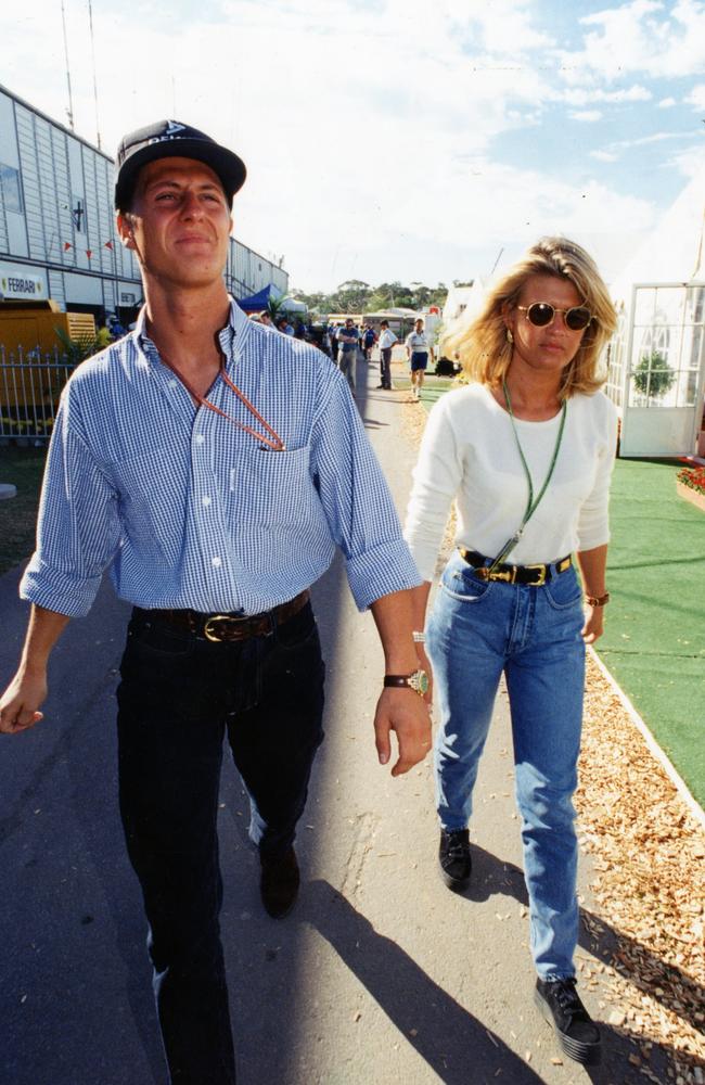 Michael Schumacher walking through the pits with Corinna at the Australian Grand Prix in Adelaide in 1994.