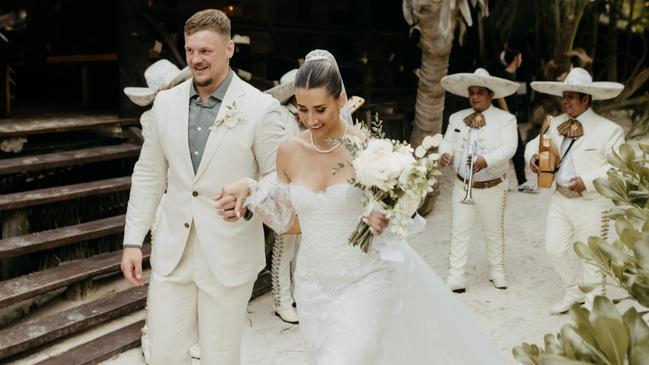 The happy couple were accompanied by a mariachi band.