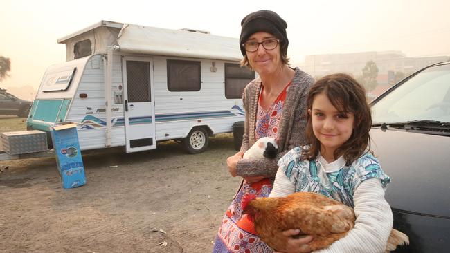 Louise McCarthy and Annabel have evacuated to Swan Reach from Bumberrah with some pet chickens and a guinea pig. Picture: David Crosling