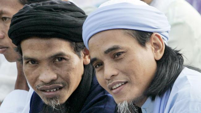Convicted Bali bombers Amrozi Nurhasyim, right, and Ali Ghufron, pictured here on death row in October 2008.Picture: AP Photo/Dita Alangkara)