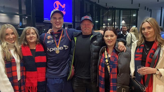 Nick Lowden with his family – parents Tony and Kerry Lowden and sisters Elena, Chelsey and Cailin – after the Norwood grand final in 2022. Picture: Supplied by family