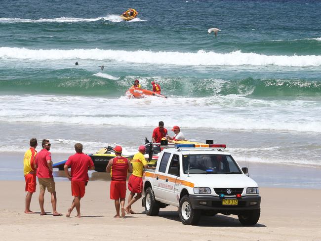 Lifesavers search for any sign of the shark at Shelly beach. Picture: Jason O'Brien