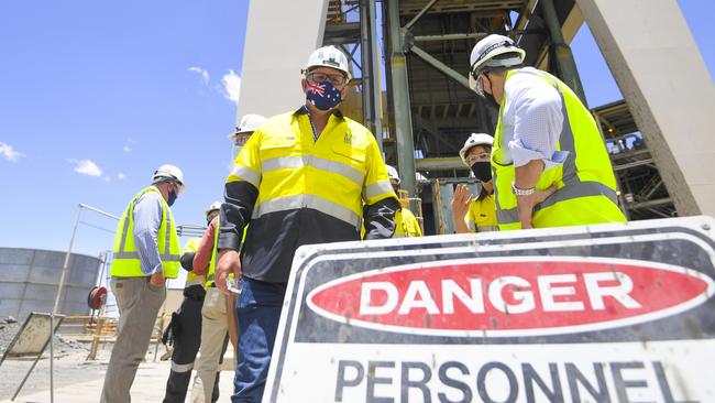 Prime Minister Scott Morrison is seen in front of the head frame during a visit to South32 Cannington Mine in McKinlay on Wednesday. Picture: AAP Image/Lukas Coch