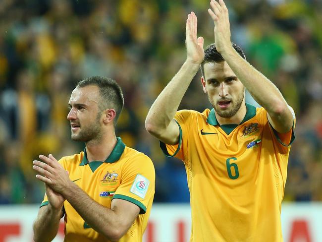 MELBOURNE, AUSTRALIA - JANUARY 09: Ivan Franjic and Matthew Spiranovic of Australia celebrate after Australia defeated Kuwait during the 2015 Asian Cup match between the Australian Socceroos and Kuwait at AAMI Park on January 9, 2015 in Melbourne, Australia. (Photo by Robert Cianflone/Getty Images)