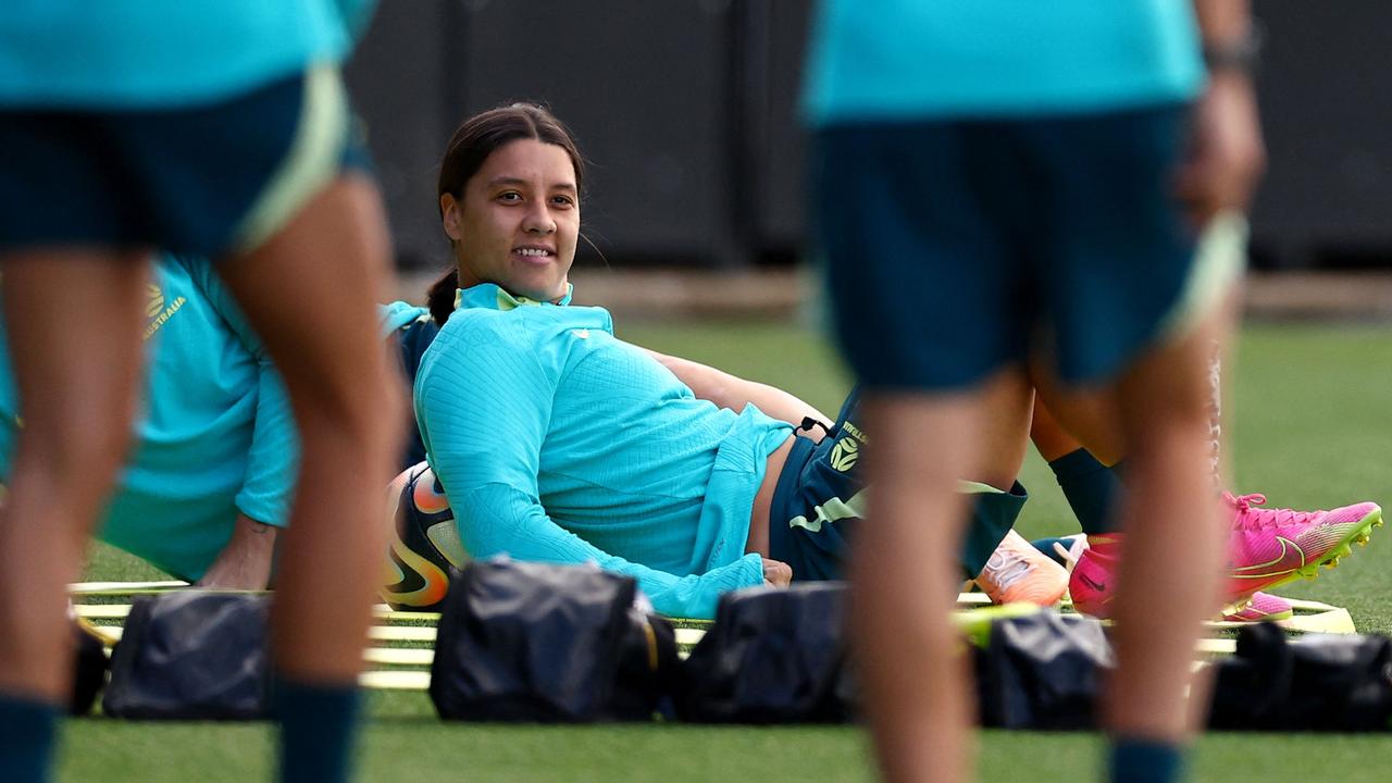 Sam Kerr stretches during a training session on Tuesday. (Photo by FRANCK FIFE / AFP)