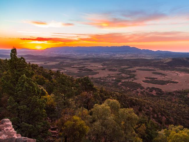 3/12Wilpena Pound, Flinders Ranges
Time: 457km north of Adelaide, about 5 hours
Surrounded by the mountains of the Flinders Ranges National Park, the reddish hues of the Wilpena Pound rock basin have to be seen to be believed. Picture: Duy Dash/SATC