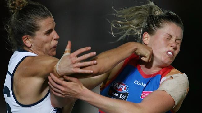 Chelsea Randall spoils Katie Brennan. The Bulldogs skipper will miss Round 3 of the AFLW season. Picture: Wayne Ludbey