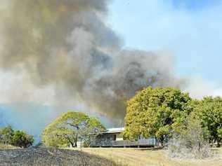 BLAZE: Up to 16 fire crews battled a bushfire west of Calliope on Father's Day. It broke out near properties on Potters Road. Picture: Matt Taylor GLA020918FIRE