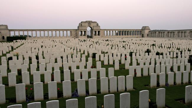 The grave stones of soldiers killed in the Battle of Somme line up at sunset at the Pozieres Memorial. Picture: Scott Barbour/Getty Images