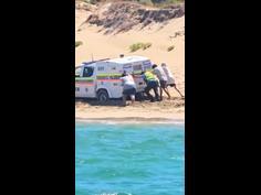 WA Cops bogged on the beach... again