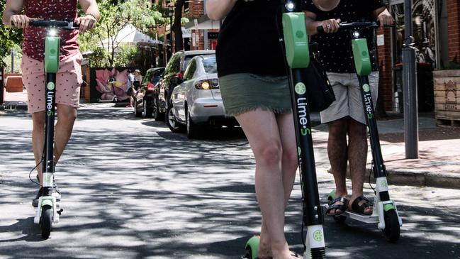 Lime e-scooters can be seen around the CBD. Picture: AAP Image/ Morgan Sette