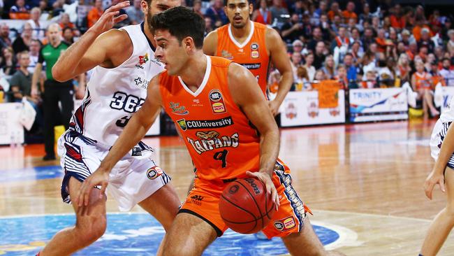 George Blagojevic drives the ball to the hoop in the National Basketball League (NBL) match between the Cairns Taipans and the Adelaide 36ers, held at the Cairns Convention Centre. PICTURE: BRENDAN RADKE.