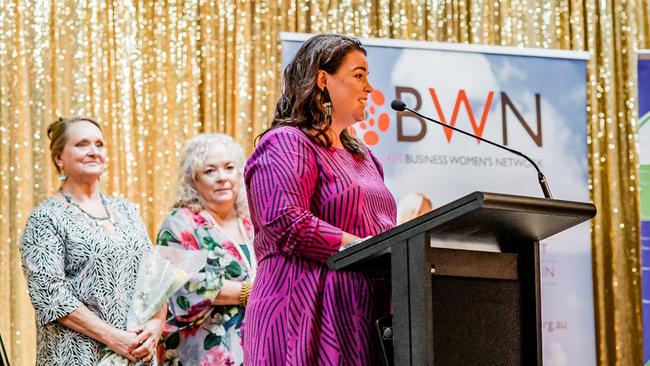 Emma Aspden addresses the crowd at the International Women’s Day breakfast. Photo: Jay Black / And the trees photography