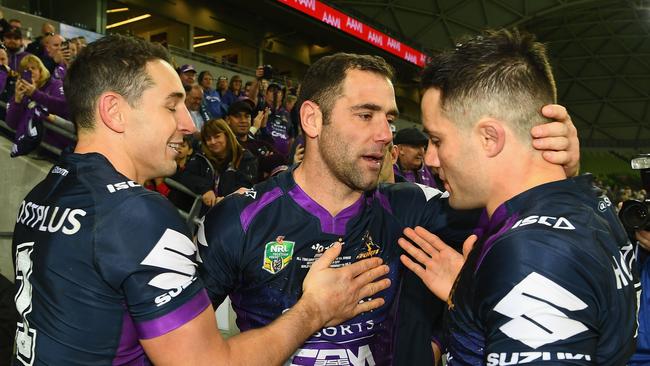 MELBOURNE, AUSTRALIA — SEPTEMBER 09: Cameron Smith of the Storm celebrates with Billy Slater and Cooper Cronk after winning the NRL Qualifying Final match between the Melbourne Storm and the Parramatta Eels at AAMI Park on September 9, 2017 in Melbourne, Australia. (Photo by Quinn Rooney/Getty Images)