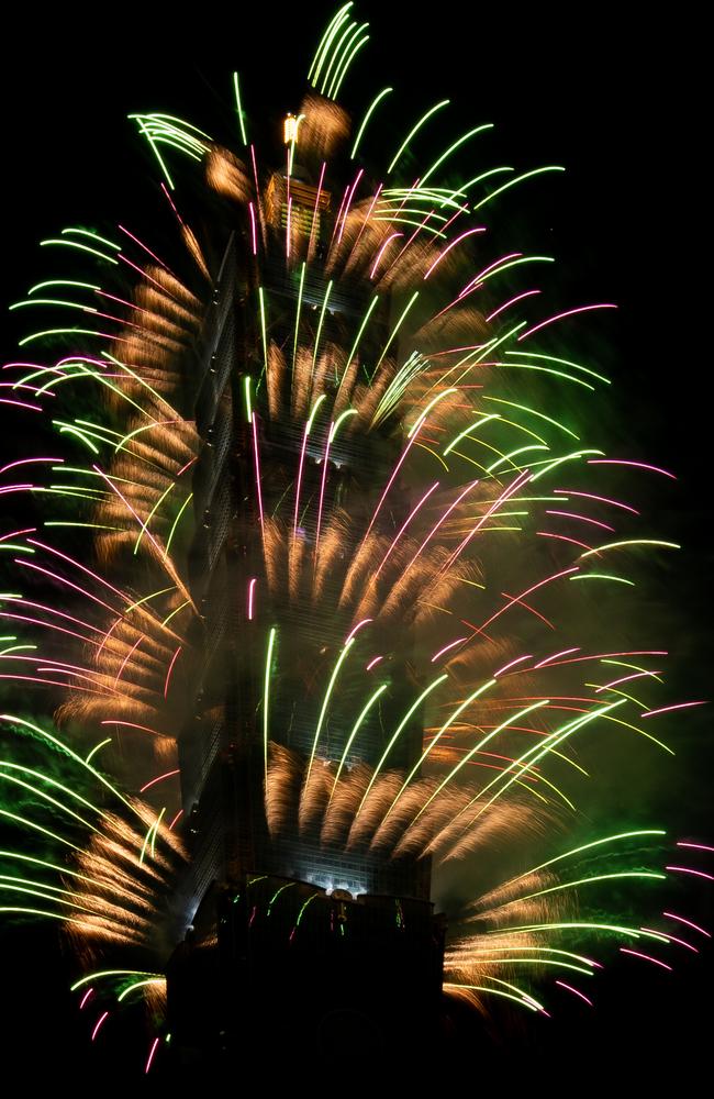 Fireworks light up the Taiwan skyline and Taipei 101 during New Year's Eve celebrations. Picture: Getty