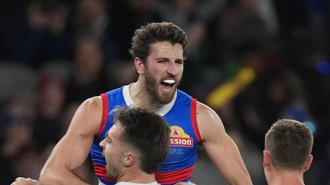 MELBOURNE, AUSTRALIA – JUNE 15: Marcus Bontempelli of the Bulldogs celebrates kicking a goal during the round 14 AFL match between Western Bulldogs and Fremantle Dockers at Marvel Stadium, on June 15, 2024, in Melbourne, Australia. (Photo by Daniel Pockett/Getty Images)