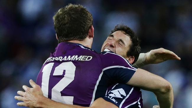 Billy Slater and Ryan Hoffman celebrate Melbourne’s 2012 grand final win.