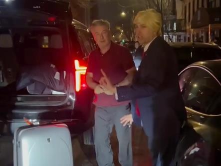 Alec Baldwin is confronted by comedian Jason Scoop.