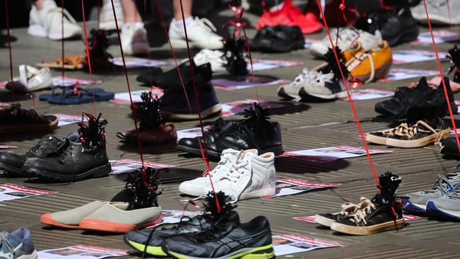 Empty shoes and empty prams signified the children and adults taken hostage by militant group Hamas. Picture: NCA NewsWire / Gaye Gerard