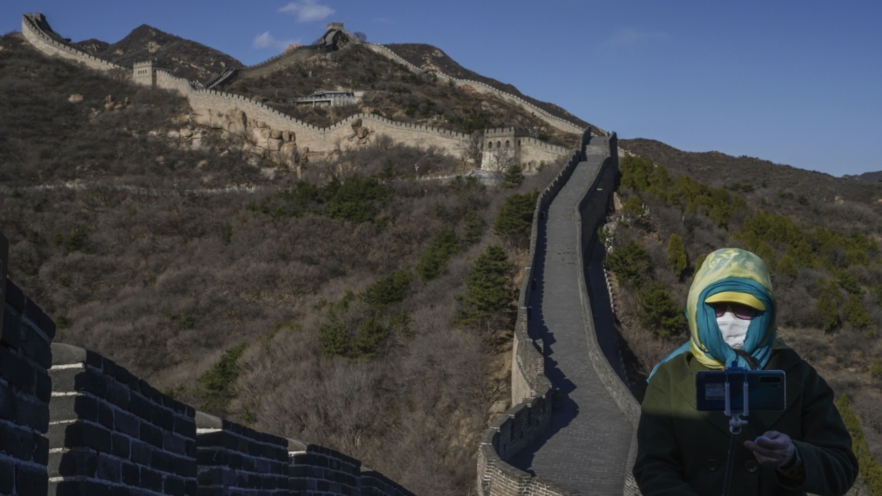 ‘Unbelievable’: Tradies arrested for smashing hole in Great Wall of China