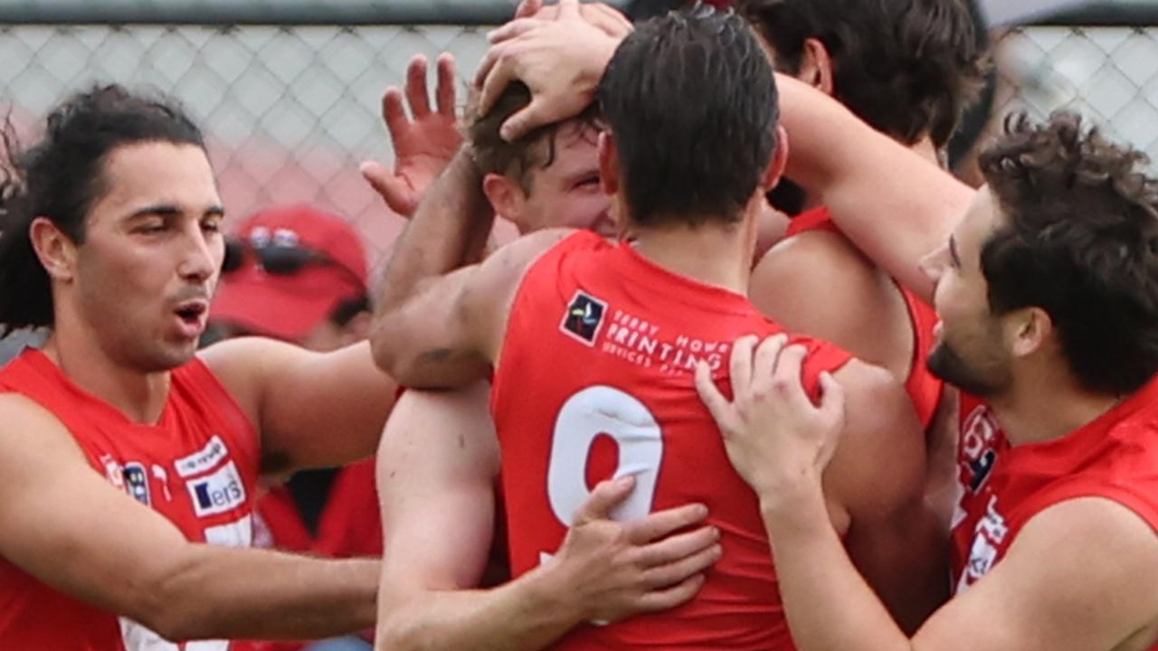 Roosters players celebrate a goal during the Round 4 SANFL match between North Adelaide and Woodville West Torrens at Prospect Oval in Adelaide, Sunday, April 30, 2023. (SANFL Image/David Mariuz)