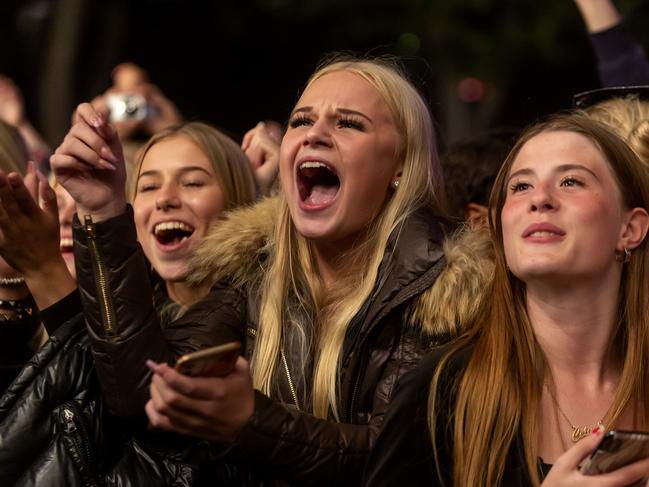 COPENHAGEN, DENMARK - SEPTEMBER 10: Concert goers seen at Tivolis first Covid-19 restriction free event watch rapper Tessa perform on stage on September 10, 2021 in Copenhagen, Denmark. Denmark recently announced that the Covid-19 virus was no longer a critical public health issue and that all Covid related restrictions would be lifted this Friday.  The country's high vaccination rate, at 71% of the population, makes Denmark the third most vaccinated country in Europe. However, former prohibition notices are expected to be succeeded by recommendations related to specific activities or sectors, like employees working with elderly people should be Cortona tested regularly regardless of their vaccination status.  (Photo by Ole Jensen/Getty Images)