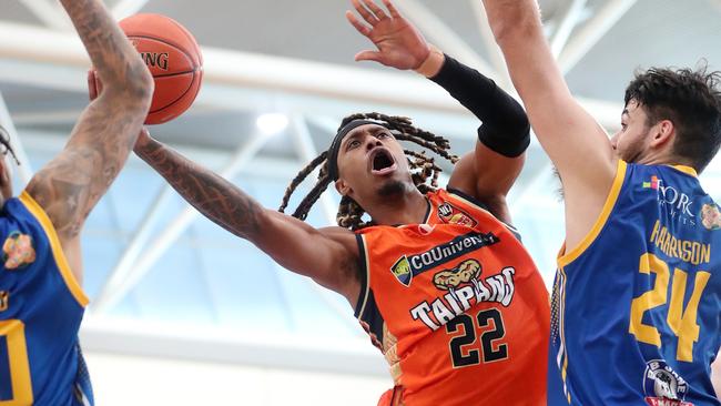 Tahjere McCall of the Cairns Taipans and Tyrell Harrison of the Brisbane Bullets. (Photo by Sarah Reed/Getty Images)