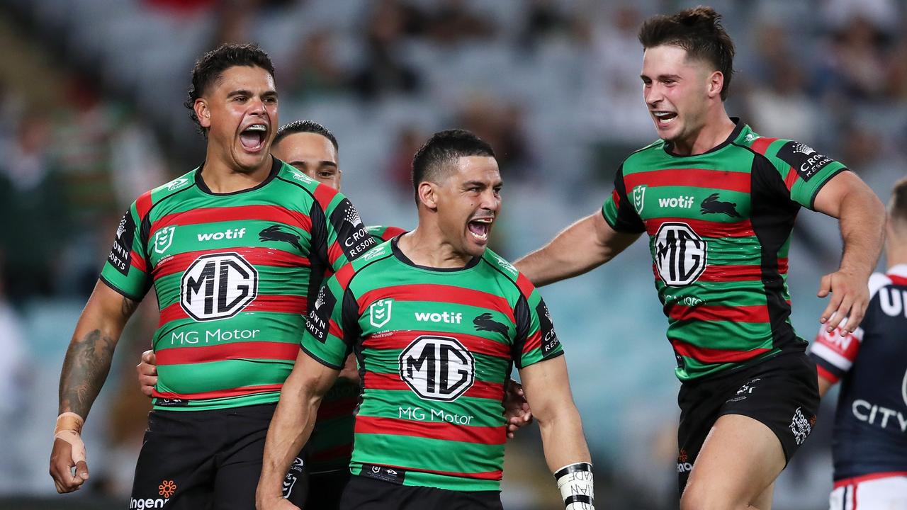 SYDNEY, AUSTRALIA - MARCH 25: Cody Walker of the Rabbitohs celebrates with Latrell Mitchell, Keaon Koloamatangi and Lachlan Ilias of the Rabbitohs after scoring a try during the round three NRL match between the South Sydney Rabbitohs and the Sydney Roosters at Accor Stadium, on March 25, 2022, in Sydney, Australia. (Photo by Matt King/Getty Images)