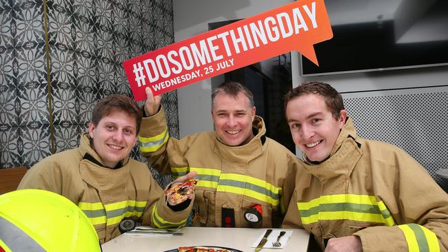 Club Toukley supports Do Something Day every year. Today they are offering free pizza..Firefighter Cale Henly, Captain Steve McKay and Firefighter Ben Williams from Toukley Fire Station at Club Toukley 3rd July 2018.(AAP Image/Sue Graham)