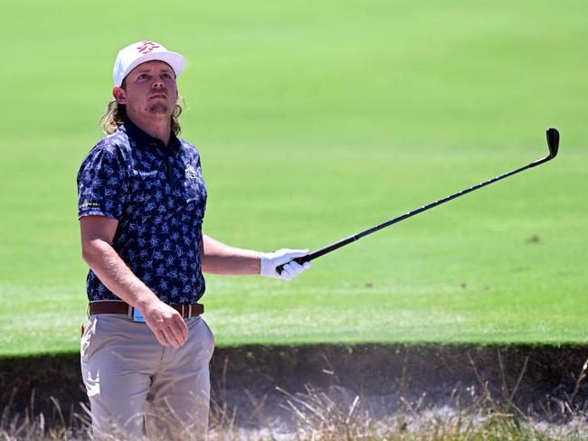 Cameron Smith of Australia hits out of a bunker during the second round of the 2024 ISPS Handa Australian Open Golf tournament at the Kingston Heath Golf Club in Melbourne on November 29, 2024. (Photo by William WEST / AFP) / --IMAGE RESTRICTED TO EDITORIAL USE - STRICTLY NO COMMERCIAL USE--