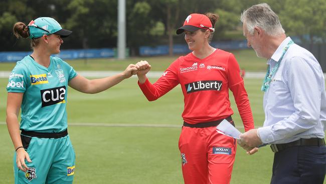 Amy Satterthwaite of the Renegades and Jess Jonassen of the Heat bump fists before their WBBL clash. Picture: Mark Metcalfe/Getty Images