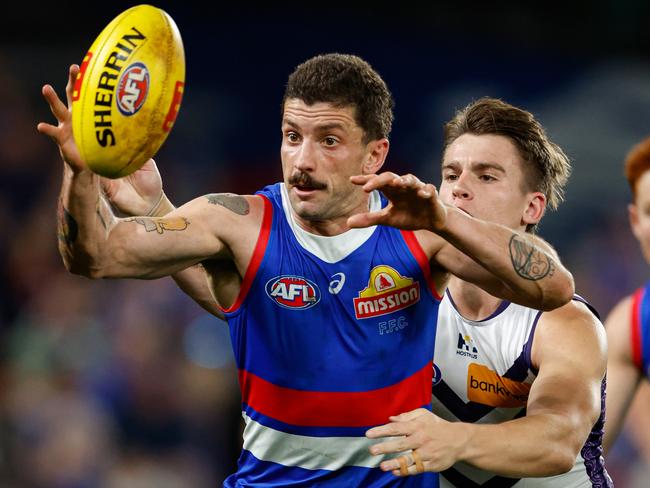 Tom Liberatore got the better of fellow midfield star Caleb Serong. Picture: Dylan Burns/AFL Photos
