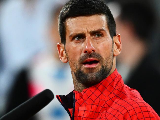 PARIS, FRANCE - MAY 31: Novak Djokovic of Serbia looks on after winning match point against Marton Fucsovics of Hungary during the Men's Singles Second Round Match on Day Four of the 2023 French Open at Roland Garros on May 31, 2023 in Paris, France. (Photo by Clive Mason/Getty Images)