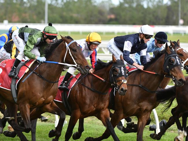 MELBOURNE, AUSTRALIA - OCTOBER 16: Brett Prebble riding Incentivise in to the first turn before winning Race 9, the Carlton Draught Caulfield Cup, during Caulfield Cup Day at Caulfield Racecourse on October 16, 2021 in Melbourne, Australia. (Photo by Vince Caligiuri/Getty Images)