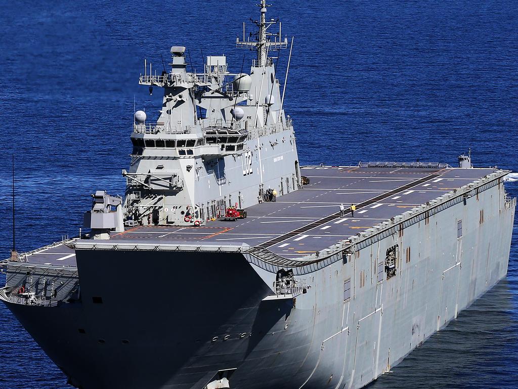 A witness on the Australian warship HMAS Canberra says Australian helicopter pilots were struck by lasers from Chinese boats. Picture: Chris Kidd