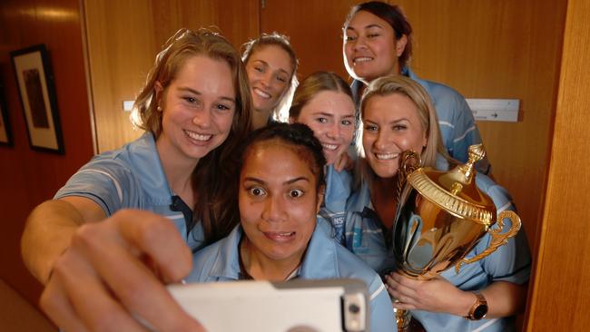 Players with the Nellie Doherty Cup after last year’s win.