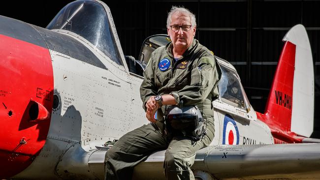 Jim Whalley with one of his planes, a de Havilland Chipmunk, in Woodside. Picture: Matt Turner