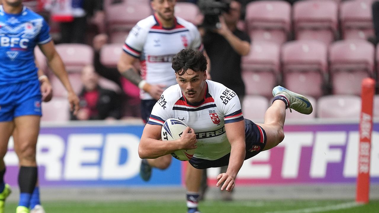 England's Herbie Farnworth goes over for a try. Picture: Martin Rickett/Getty