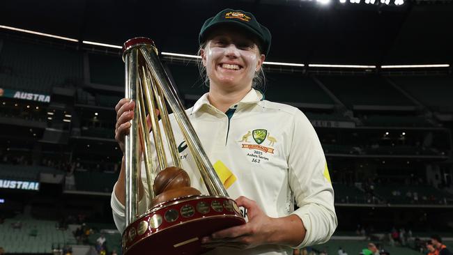 Alyssa Healy of Australia poses with the Ashes trophy after her side defeated England in the Test at the MCG Picture: Getty Images