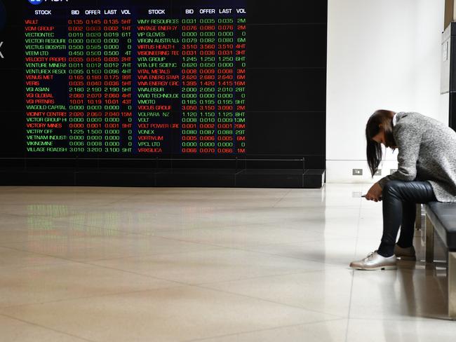 Digital market boards at the Australian Stock Exchange (ASX) in Sydney, Tuesday, March 10, 2020. Australia's turbulent stockmarket has surged more than one per cent higher in a dramatic recovery from early panic selling. (AAP Image/Joel Carrett) NO ARCHIVING