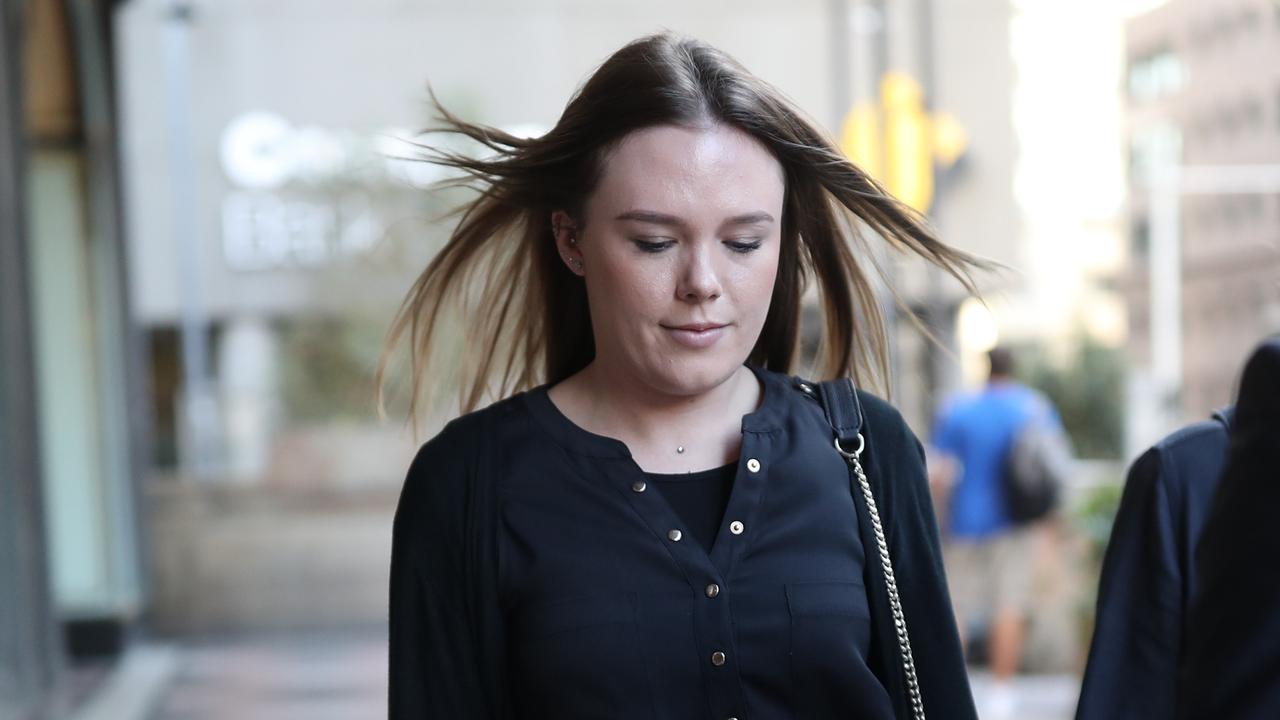 SYDNEY, AUSTRALIA - NewsWire Photos APRIL 19, 2021 - Sydney teacher Monica Young (Back-Left) leaves the Downing Centre in Sydney. Picture: NCA NewsWire / Christian Gilles