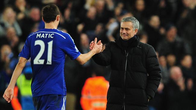 Chelsea player Nemanja Matic is congratulated by his mananger Jose Mourinho