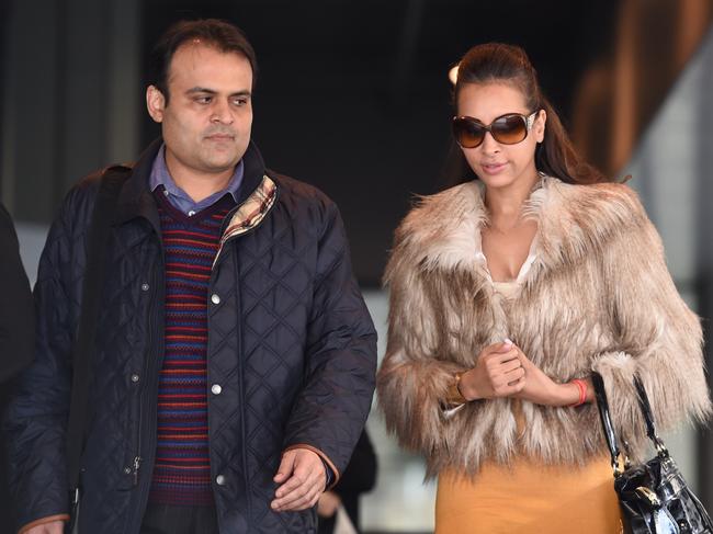 Pankaj and Radhika Oswal leave the William Cooper Justice Centre in Melbourne. (AAP Image/Tracey Nearmy)