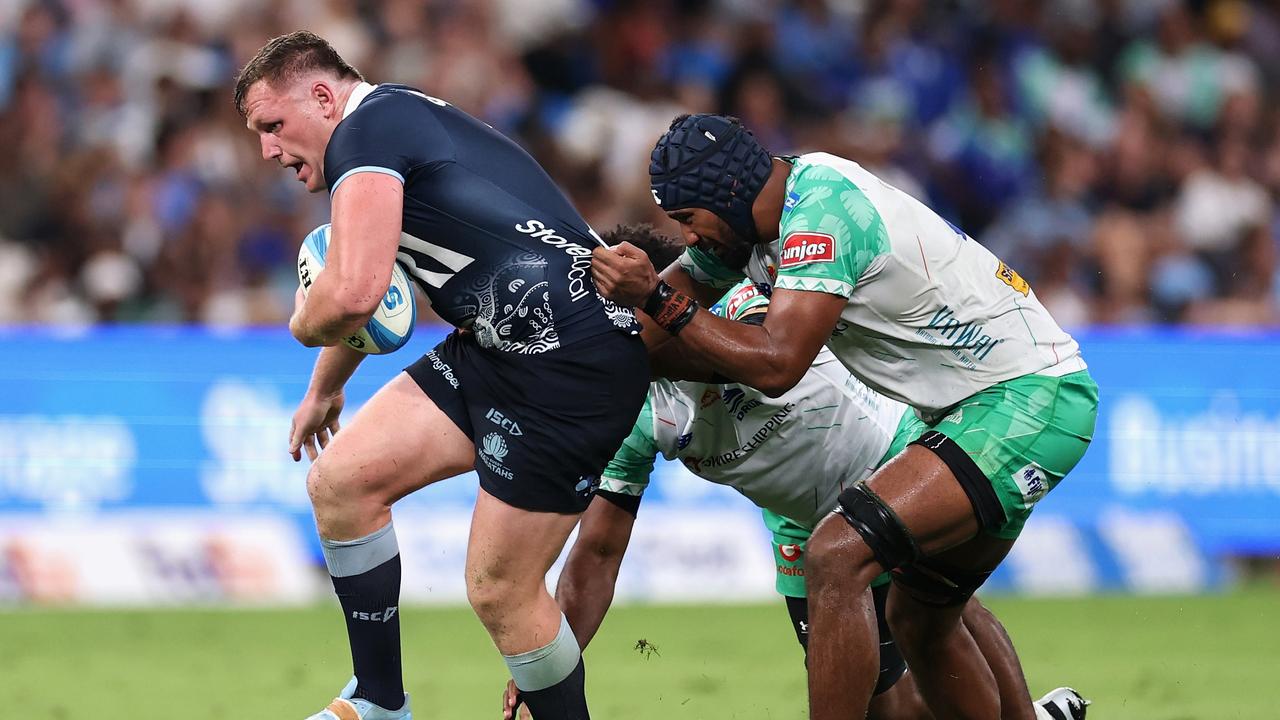 Angus Bell is tackled during the last round of Super Rugby Pacific against Fijian Drua.