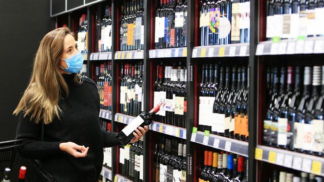 A shopper inside the new concept Liquorland store in Oakleigh. Picture: Aaron Francis/The Australian