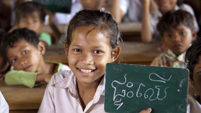 Pic shows: Chaum Sreypar in class at at Kampong Pang School. Oxfam have been building new schools in remote areas with minimal access to services, including Kampong Pang School. Facilities built include a water tank, the school building, latrines/toilets and the teachers house with solar power. Picture: Oxfam Australia